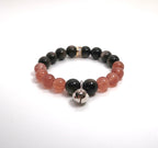 Bracelet fait main en obsidienne argentée et quartz fraise avec breloque en laiton et argent
