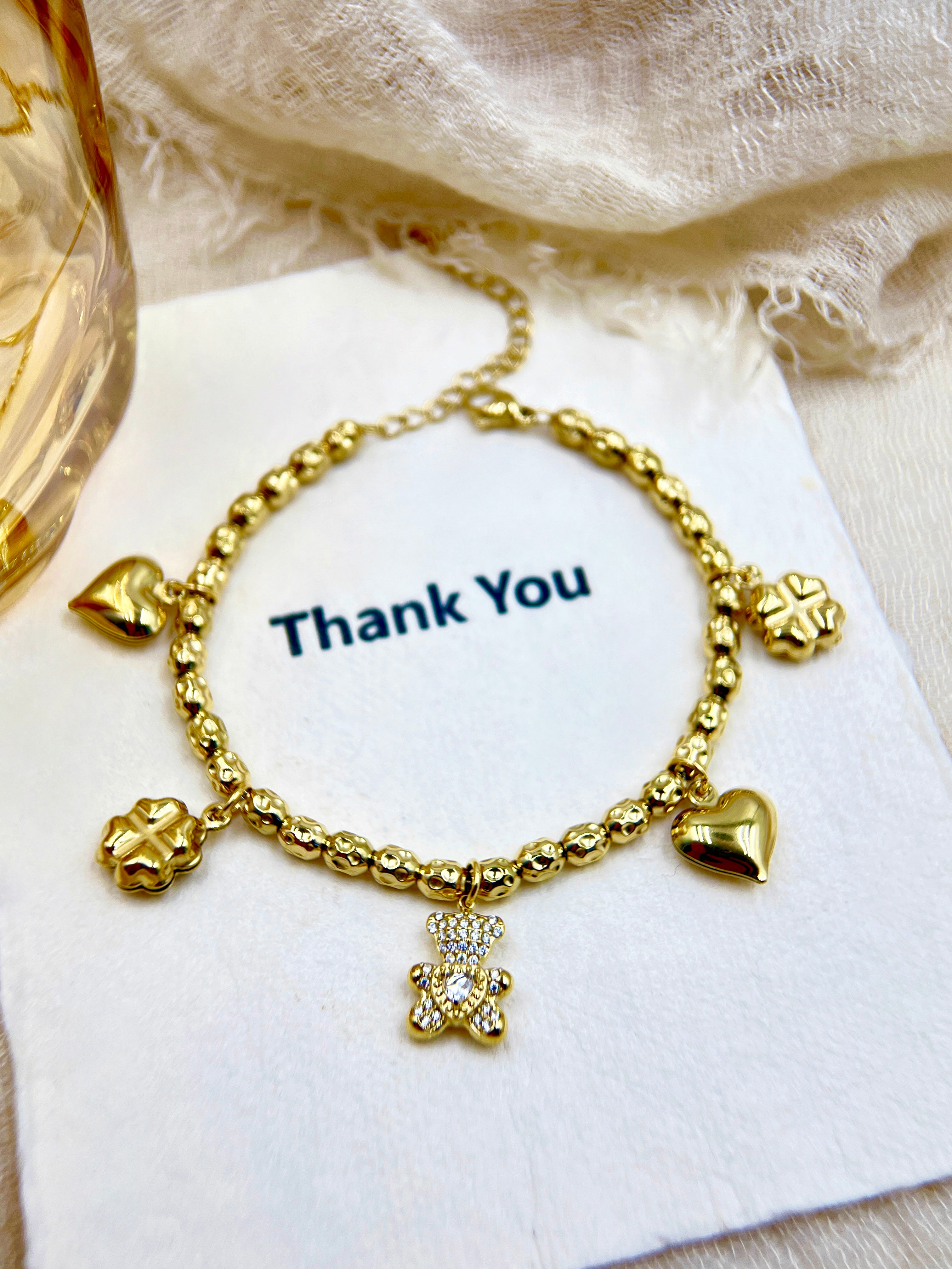 Vintage Gold Beaded Charm Bracelet with Crystal Teddy Bear, Clover & Heart Charms | Cute Gift for Her | Trendy Women's Jewelry