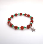 Bracelet en veines de dragon rouge et agate verte avec breloque flocon de neige argentée