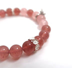 Bracelet à breloques cloche de Noël avec quartz rose et fraise