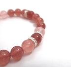 Bracelet à breloques cloche de Noël avec quartz rose et fraise