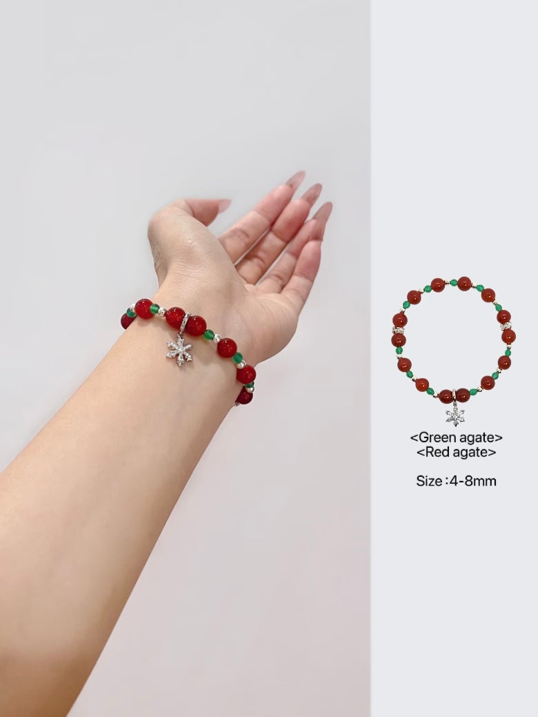 Bracelet en veines de dragon rouge et agate verte avec breloque flocon de neige argentée
