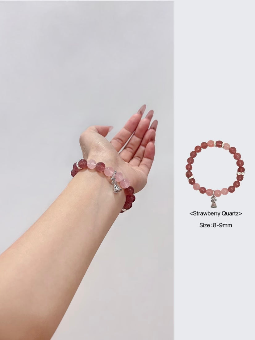 Bracelet à breloques cloche de Noël avec quartz rose et fraise