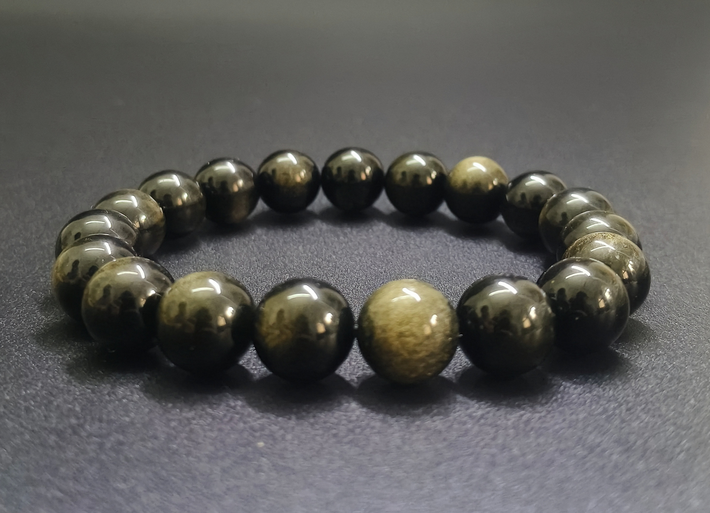 Natural black gold obsidian